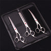 A professional stainless steel pet grooming scissors set displayed in a black leather case.