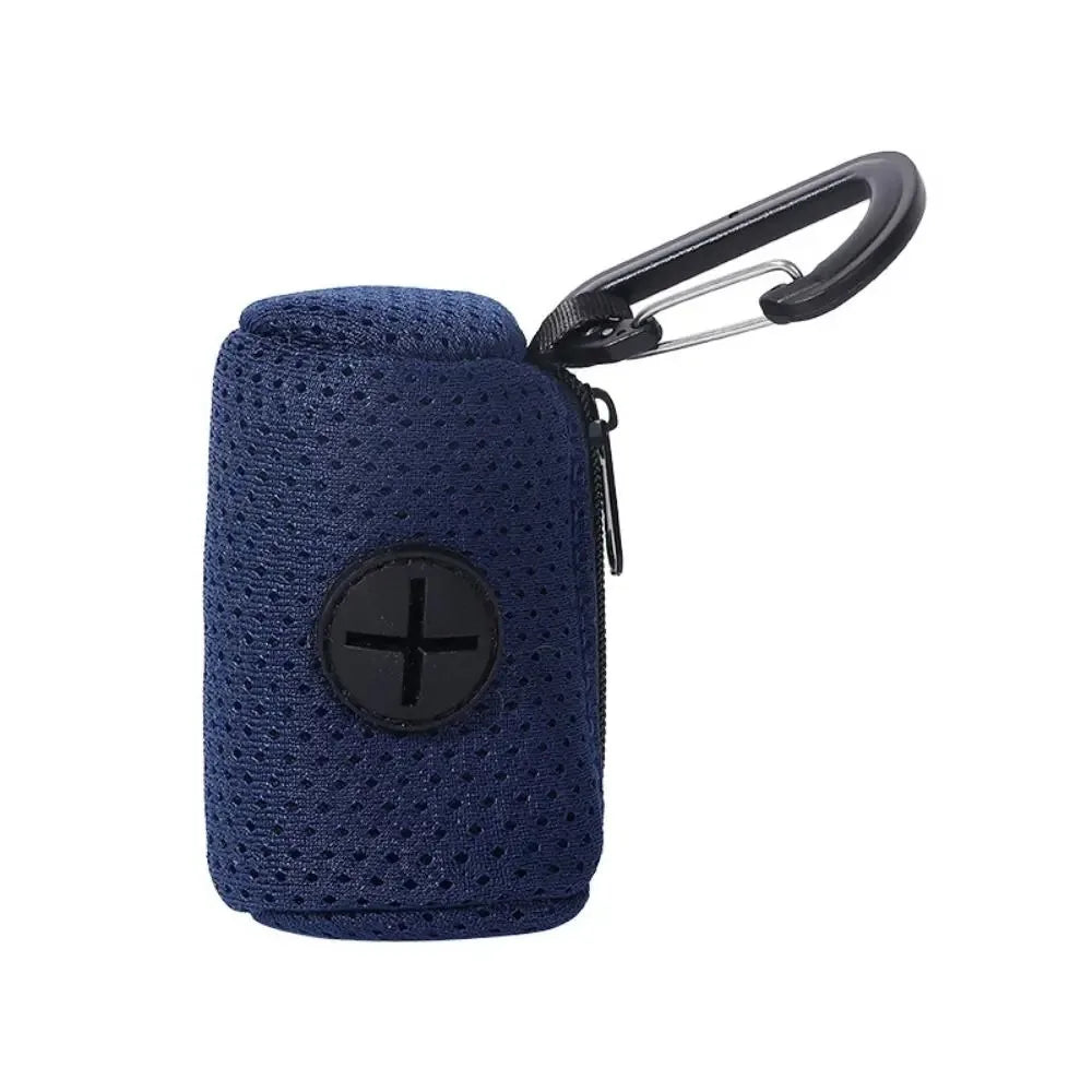 A dark blue portable mesh dog waste bag dispenser with a black clip.