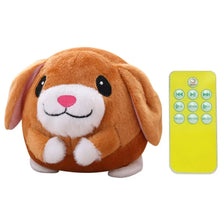 A fluffy brown dog toy with a pink nose and ears, next to a yellow electronic control panel.