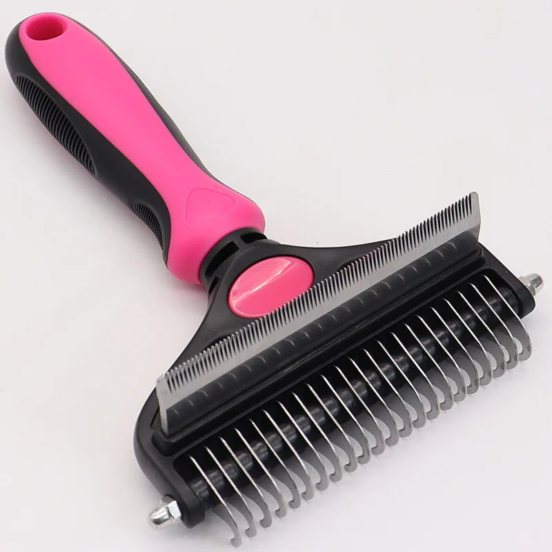 A pink and black deshedding brush for dogs and cats with a wide comb attachment.