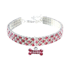 A sparkling rhinestone pet collar necklace featuring pink and clear stones.