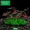 A close-up view of a model CO63-H artificial plant in red color growing in a small landscape setting.