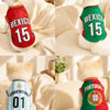 Four dog soccer jerseys in red, green, and blue featuring national team colors for summer play