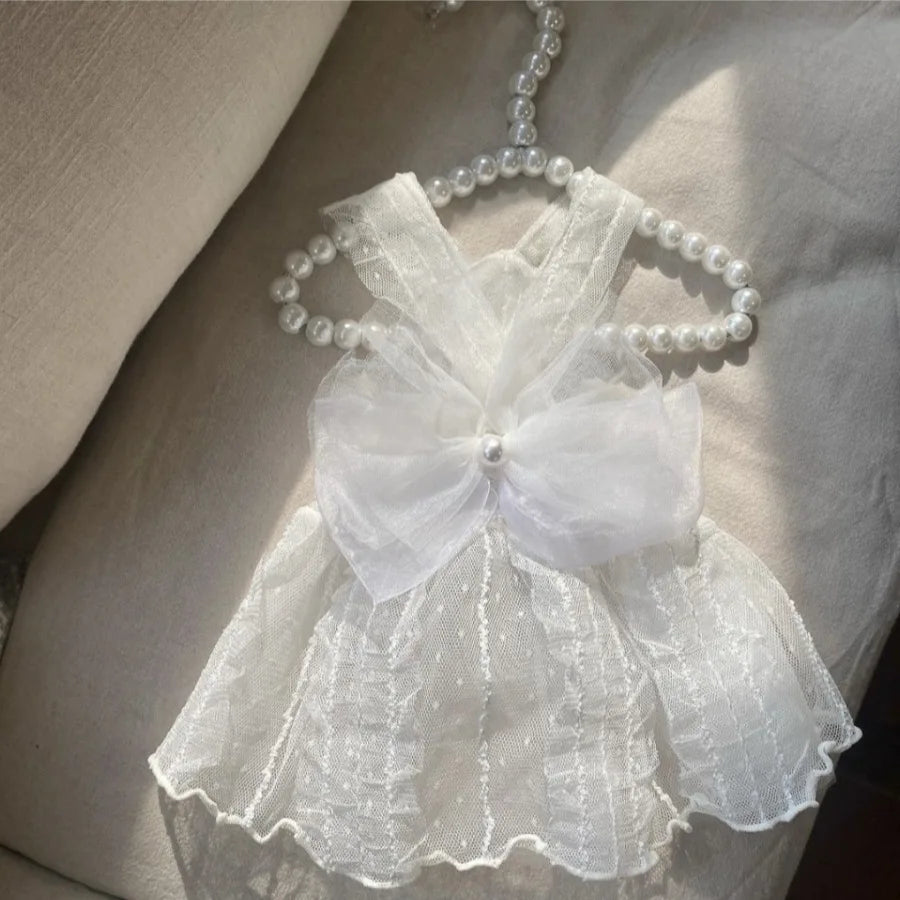 White elegant pet princess dress for dogs and cats with sheer fabric and pearl trim