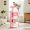 A pink 4-tier cat tree tower with cozy condos and sisal scratching posts, featuring a fluffy cat perched on top.