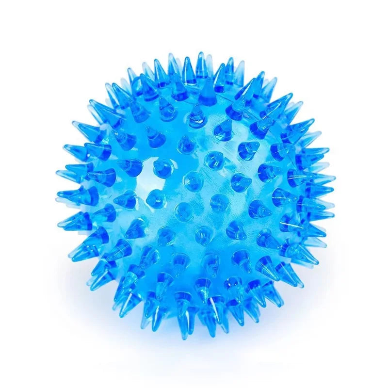 A bright blue, spiky squeaky dog ball designed for teeth cleaning and play.