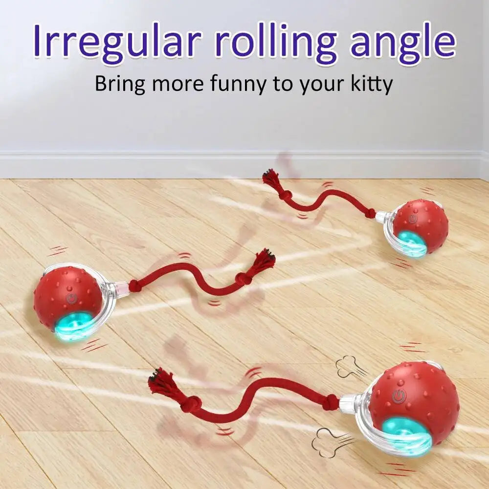 A red rolling angle cat toy is shown moving across a wooden floor.