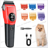 A red professional pet hair clipper with various attachments and a fluffy dog.