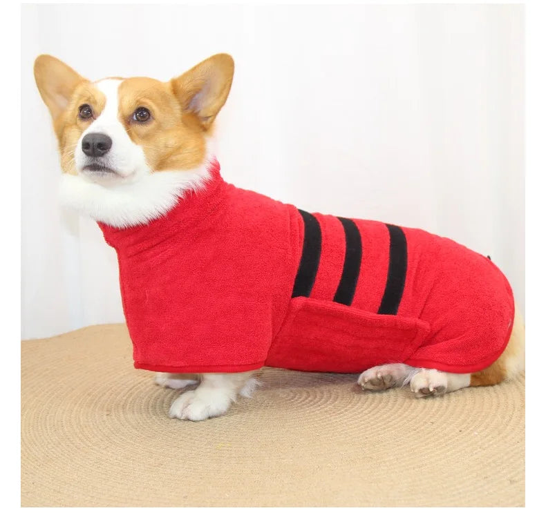 A small dog wearing a red and black striped microfiber dog robe.