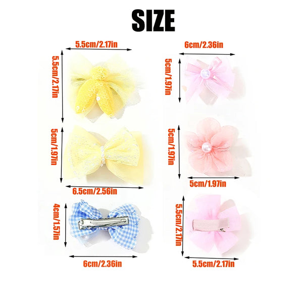 A set of five pet hair bow clips in various colors including yellow, pink, and blue for grooming accessories.