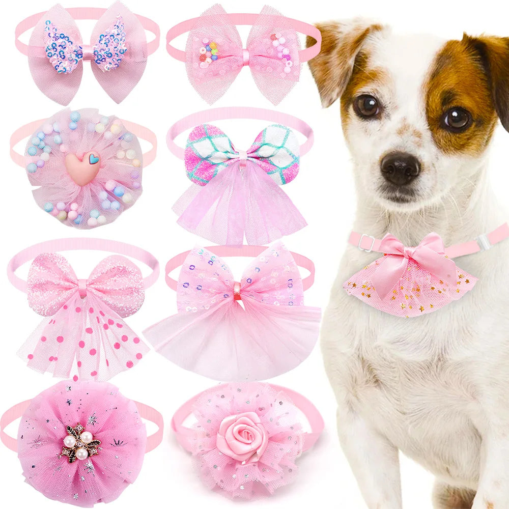 Pink lace bow tie collar accessories displayed on a dog.