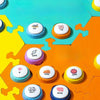 A close-up view of colorful recordable pet training buttons for dog and cat communication, featuring various colored buttons 