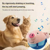 A golden retriever and a tabby cat are interacting with an interactive pet shake and jump ball toy.