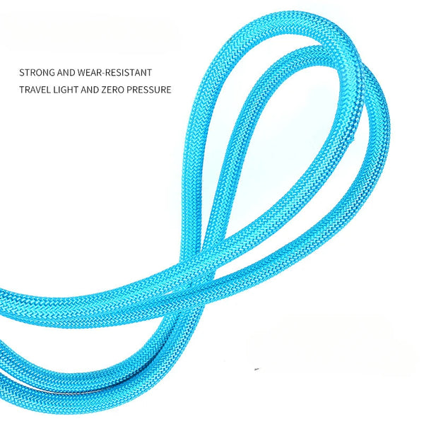 A bright blue, strong and wear-resistant adjustable hand-free dog leash coiled for travel.