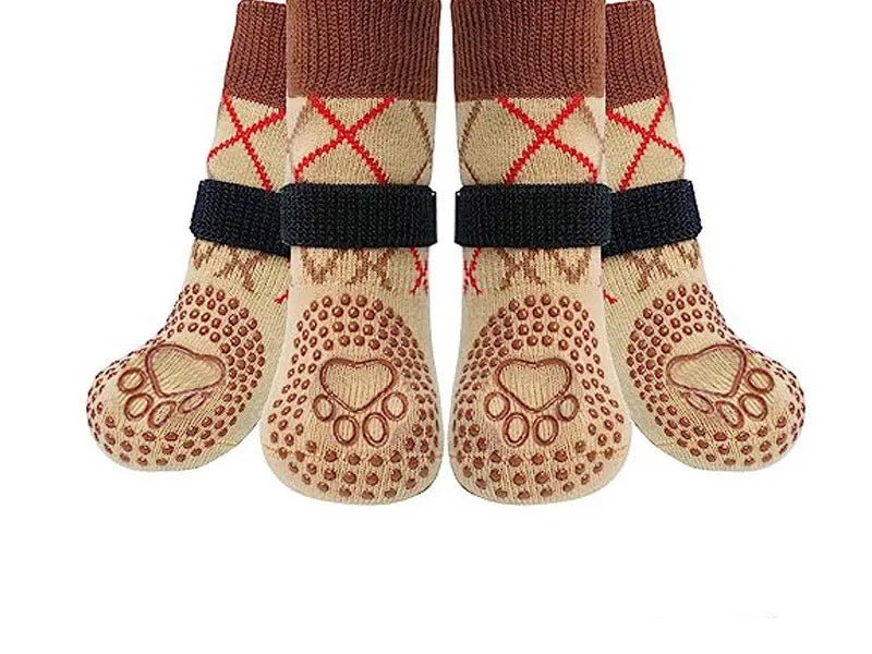 A pack of four anti-slip dog traction socks featuring brown and tan colors with red stitching.