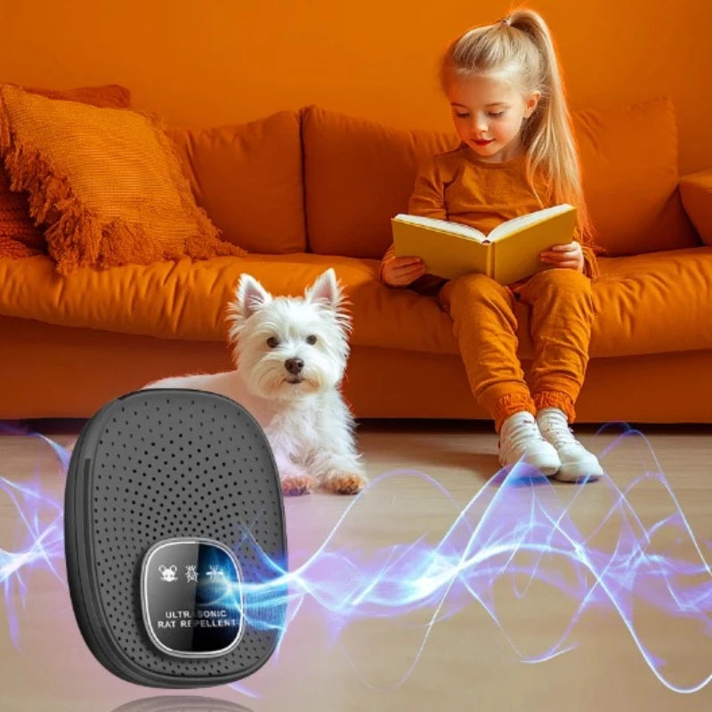 A young girl is sitting on an orange sofa with a white dog nearby, holding a black ultrasonic rodent repeller device.