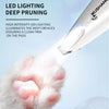 A close-up of a pet paw being illuminated by a LED lighting deep pruning trimmer for grooming.