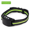 Black dog bark collar with fluorescent green accents on a black nylon strap.