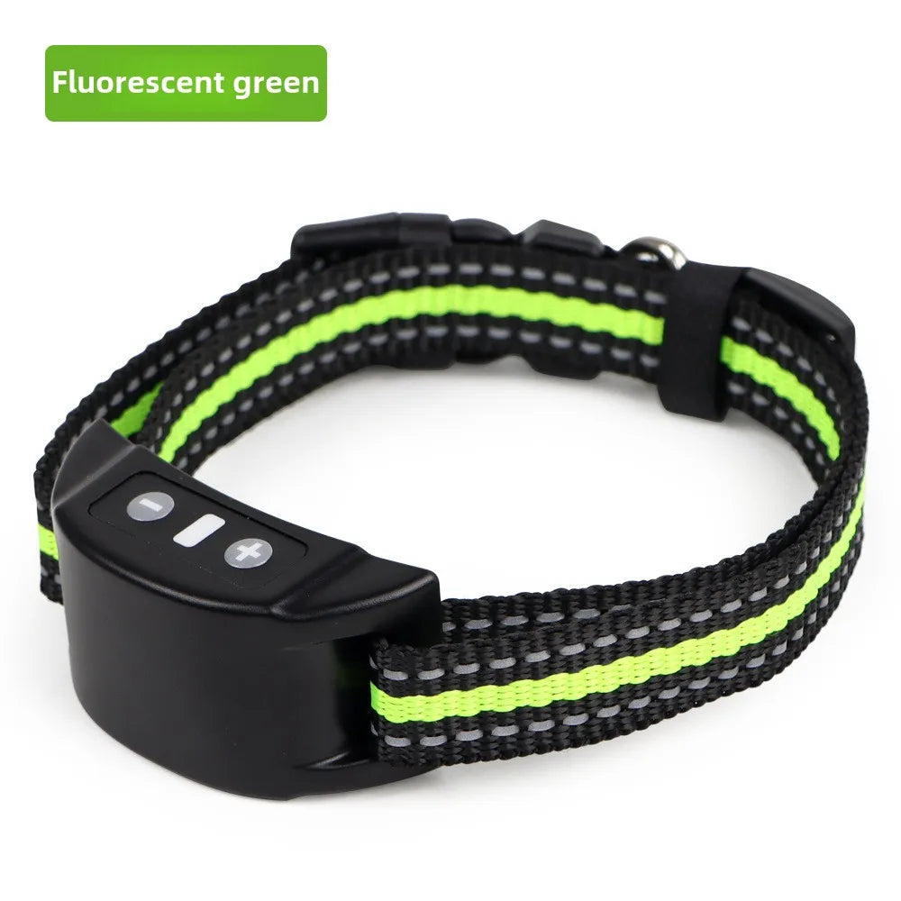 Black dog bark collar with fluorescent green accents on a black nylon strap.