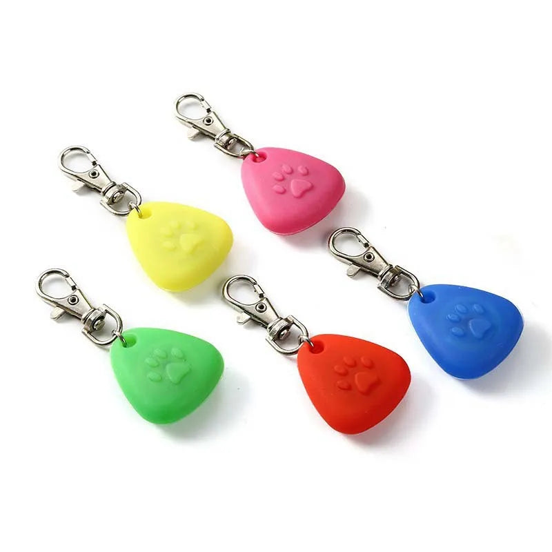 A set of five waterproof LED pet collar lights for dogs and cats in pink, yellow, green, orange, and blue.