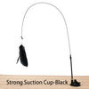 A black suction cup wand with a feather toy attached, shown against a white background.