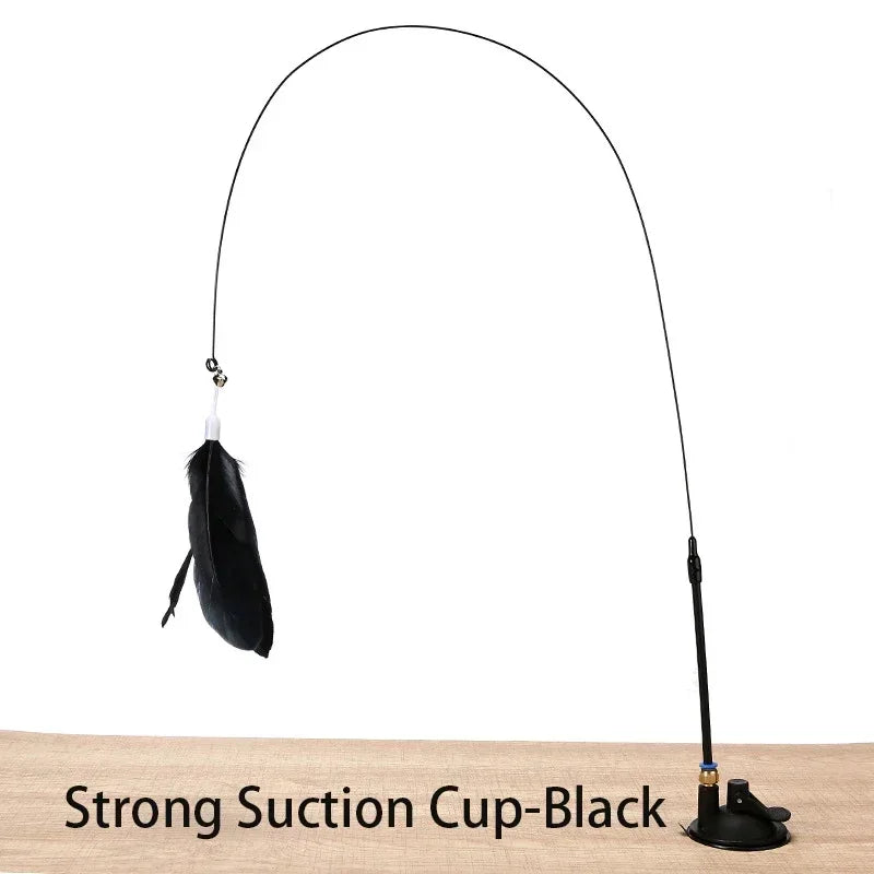 A black suction cup wand with a feather toy attached, shown against a white background.