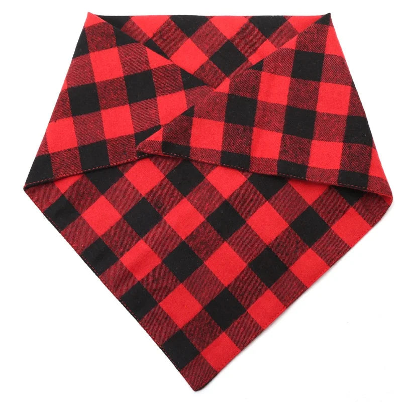 A red and black plaid bandana folded into a triangle