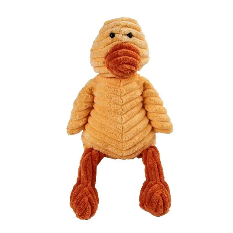 A fluffy, orange corduroy squeaky dog toy shaped like a bird.