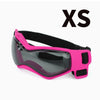 A bright pink pet safety helmet and goggles set for dogs and cats.