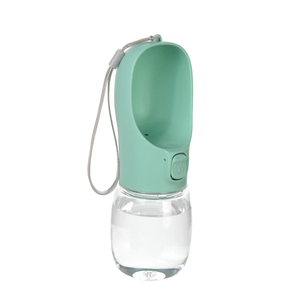 A light green portable leakproof dog water bottle with a built-in bowl and a flexible tube.