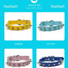 A selection of studded leather dog collars in yellow, sky blue, pink, and royal blue.