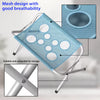 A light blue mesh pet grooming hammock with multiple holes, shown folded and a stand mechanism.