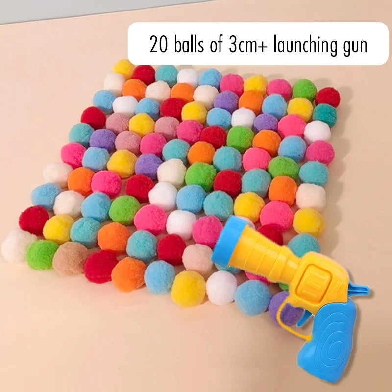 Ein Startgewehr aus Plüschbällen, mit 20 Bällen in einem Raster angeordnet.