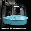 Clear plastic hanging bird bath with a mesh screen for sunscreen and splash prevention