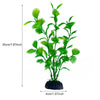 Une grande plante aquatique artificielle aux feuilles vert vif et à la base noire.