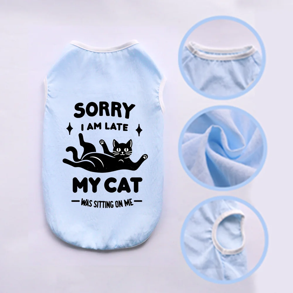 Light blue breathable summer pet vest with a black print saying Sorry I am late my cat was sitting on me