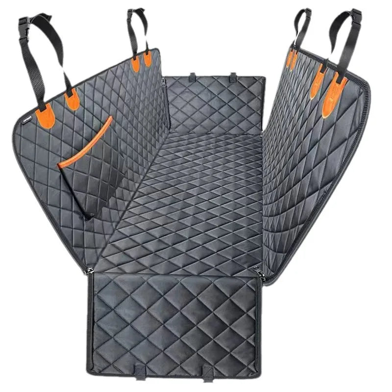 A black quilted waterproof dog car seat cover hammock with orange straps shown open.