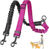 A pink dual dog leash attachment with a black bungee and handle, shown next to a small dog.