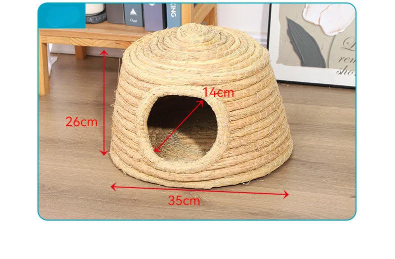A round, woven straw mat with a circular entrance for small rodents, shown on a wooden surface.