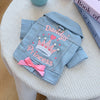 Light blue denim jacket embroidered with a pink crown and princess text for dogs
