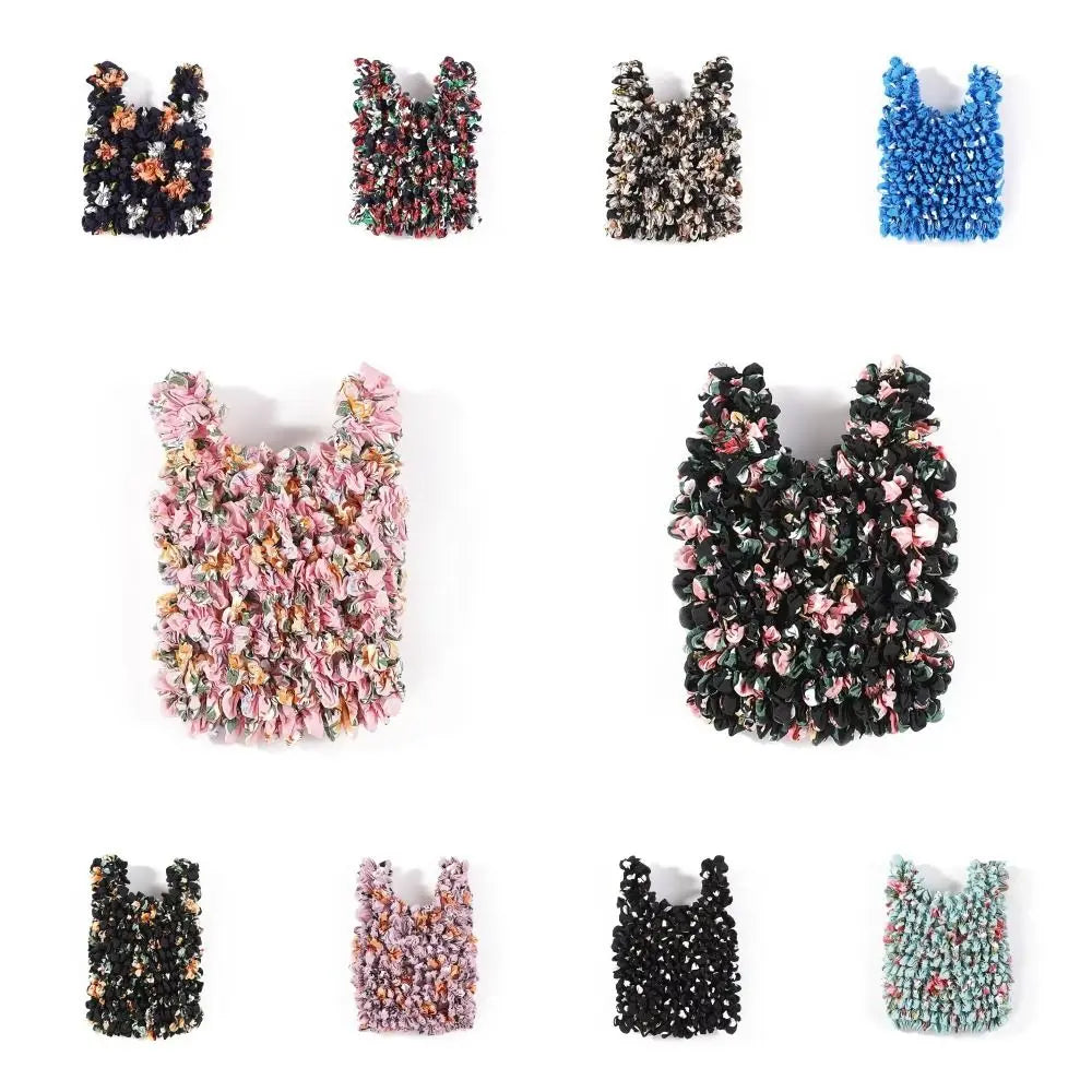 A collection of reusable foldable bubble shopping bags in various colors and textures.