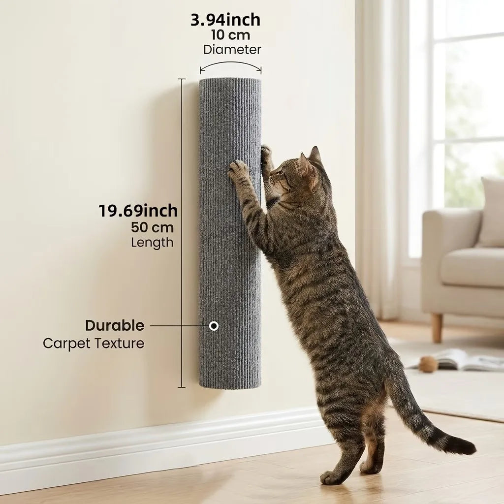 A tabby cat is interacting with a cylindrical, textured gray scratching post mounted on a wall.