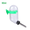 Clear plastic hanging drinker bottle with a green silicone clip and a metal tip.