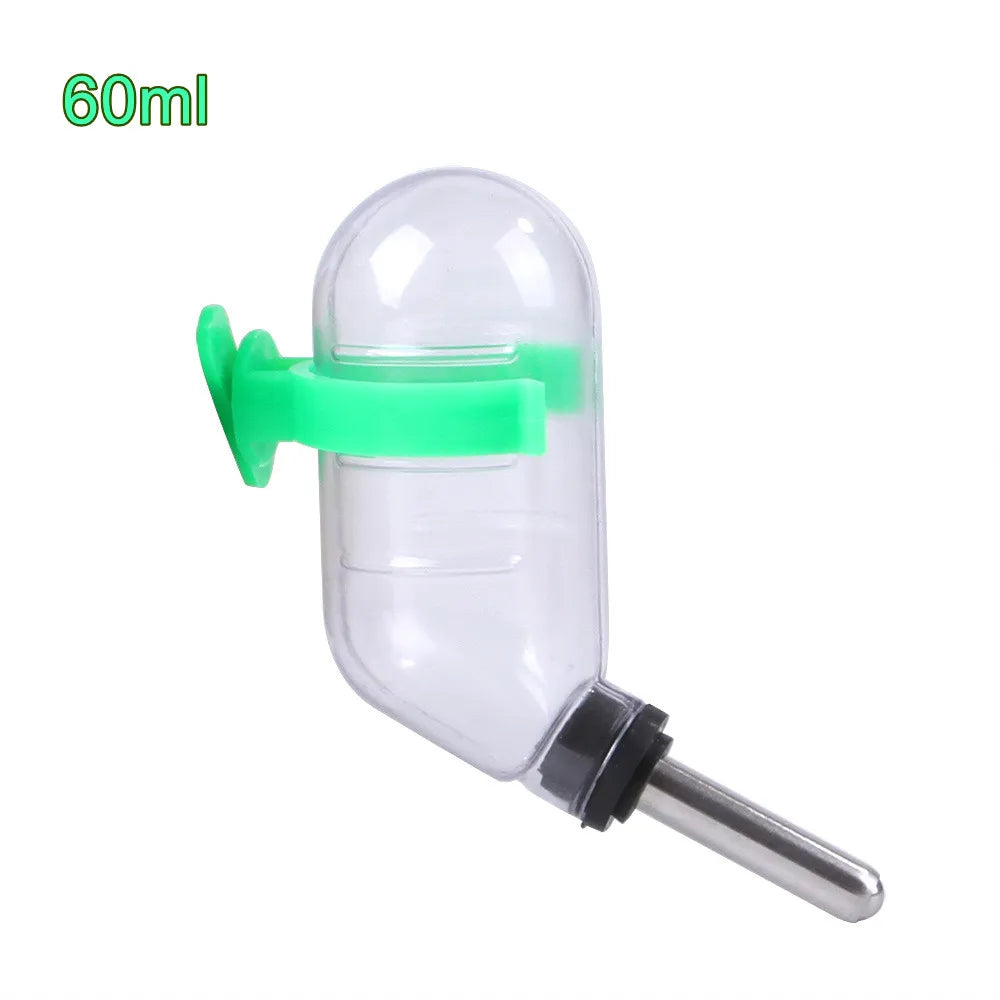 Clear plastic hanging drinker bottle with a green silicone clip and a metal tip.