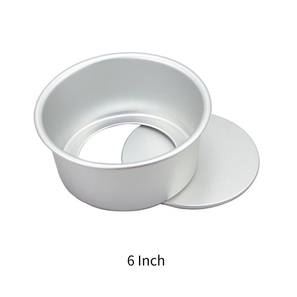 A round aluminum cake pan set consisting of a ring and a separate disc, labeled 6 Inch.