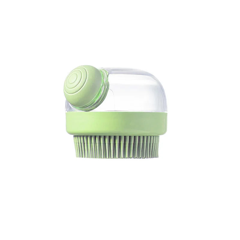 A light green silicone pet bath brush with a clear shampoo dispenser.
