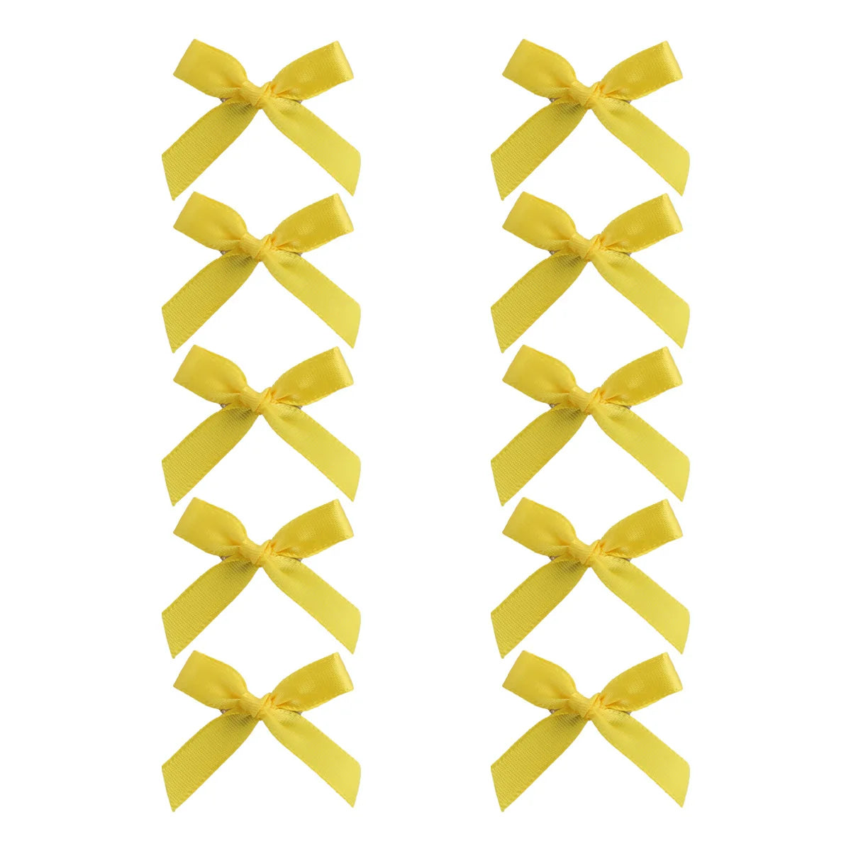 Un set de pinzas para el pelo con lazo de cinta amarilla.