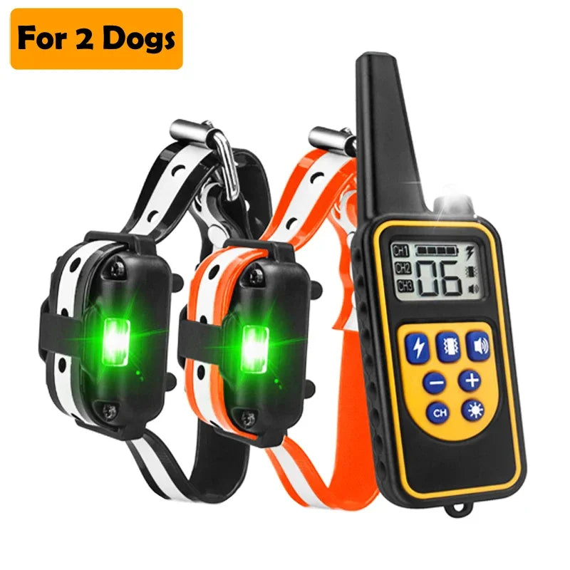 A remote dog training collar with an LCD display and a transmitter, shown for two dogs.