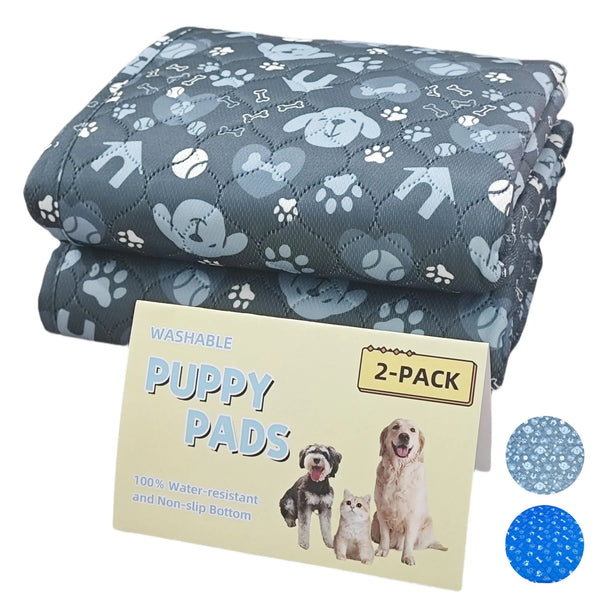 A stack of two gray puppy pads for dogs, showing the packaging and product details.