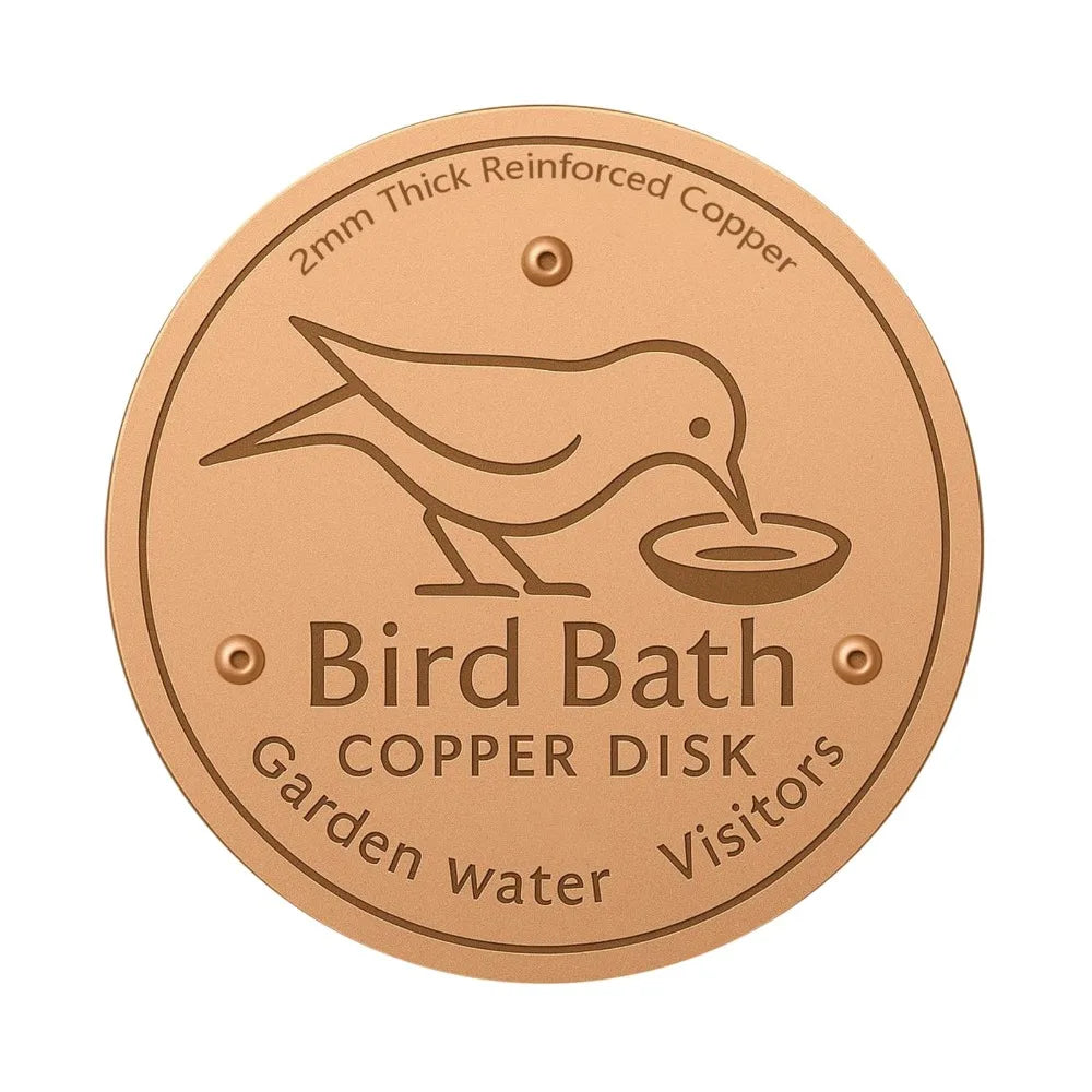 Bain à oiseaux rond en cuivre avec la silhouette d'un oiseau, conçu pour l'eau de jardin.